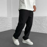 Pantalon Texturé à Rayures Verticales Coupe Ample