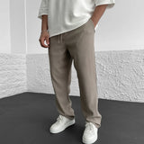 Pantalon Texturé à Rayures Verticales Coupe Ample