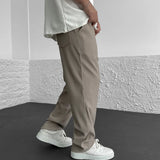 Pantalon Texturé à Rayures Verticales Coupe Ample