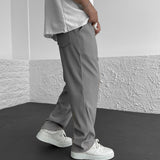 Pantalon Texturé à Rayures Verticales Coupe Ample