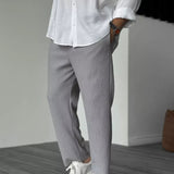 Pantalon Texturé à Rayures Verticales Coupe Ample