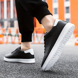 Baskets homme perforées en simili cuir mat