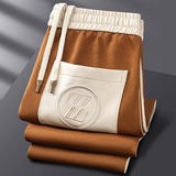 Ensemble de survêtement homme zippé à bandes latérales