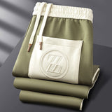 Ensemble de survêtement homme zippé à bandes latérales