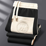 Ensemble de survêtement homme zippé à bandes latérales